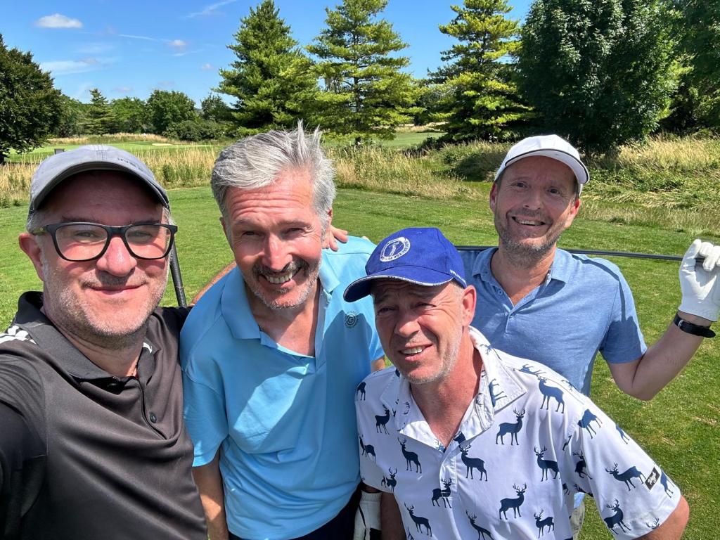 Friends playing golf